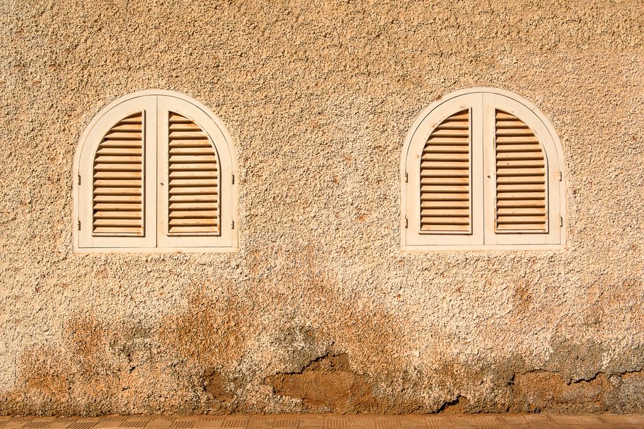 Classic white wooden plantation shutters